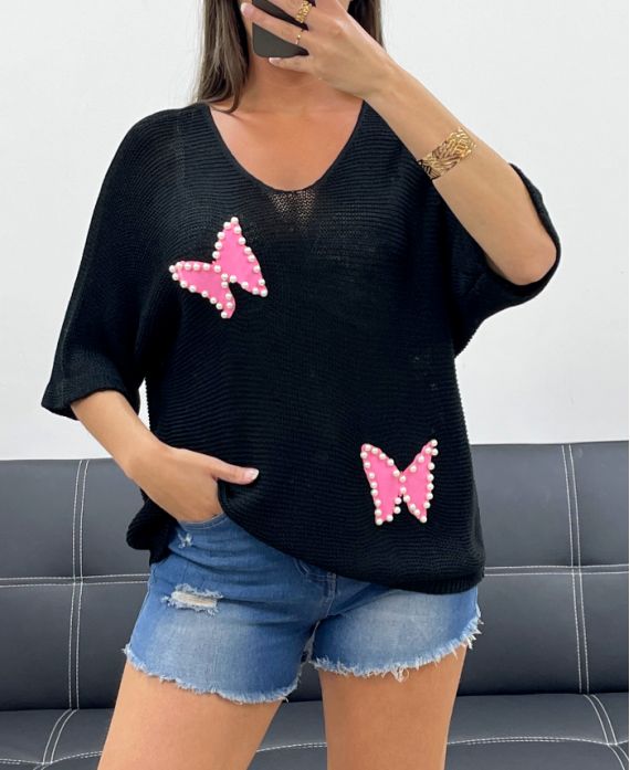 Pull maille fine clouté papillon